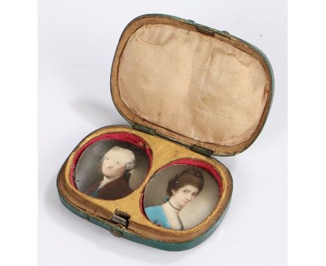 George III shagreen case, housing two portrait miniatures of a lady in a blue dress and a man in a deep red jacket, the case,