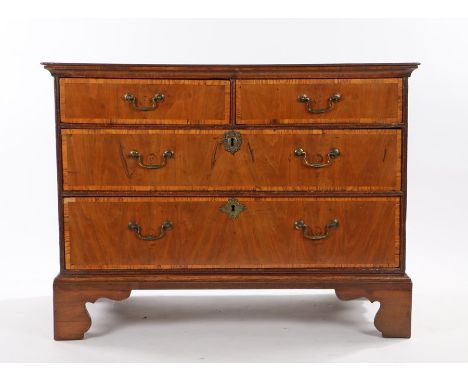 Queen Anne oak and walnut chest of drawers, the rectangular top above two short and two long crossbanded drawers on bracket f