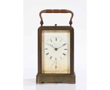 Late 19th Century brass carriage clock, the five bevelled glass case enclosing the Payne &amp; Co signed white enamel dial, l