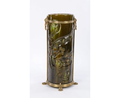 Late 19th Century ceramic stick stand, by The Bretby Art Pottery, with a green-brown glaze over a writhing dragon in relief; 