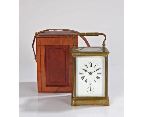 19th Century French brass cased carriage clock, the white enamel dial with Roman numerals and subsidiary alarm dial, housed i