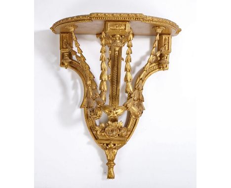 19th Century gilded wall bracket, the demi-lune top above harebell swag and foliate decoration, 40cm wide, 46cm high