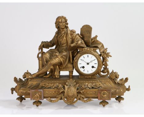 French gilt metal mantel clock, the figural clock with a gentleman writing leaning on the drum case above a shaped base wand 