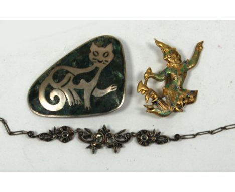 SILVER AND MARCASITE PENDANT, 935 MARK, TOGETHER WITH A MEXICAN SILVER AND GREEN ENAMELLED TRIANGULAR 'CAT' BROOCH, and a Sia