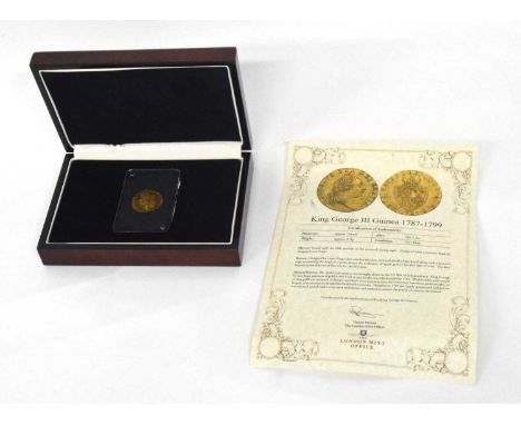 George III gold 1793 spade guinea in Royal Mint box with certificate of authenticity, condition very fine