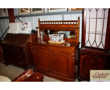 A late Victorian oak mirror back chiffonier 