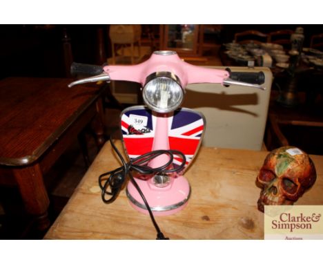 A pink Union Jack decorated table lamp in the form of a Vespa 