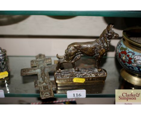 A brass mantelpiece letter rack in the form of an Alsatian; and a Crucifix ornament 