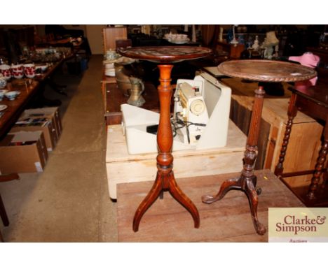 A mahogany tripod wine table 