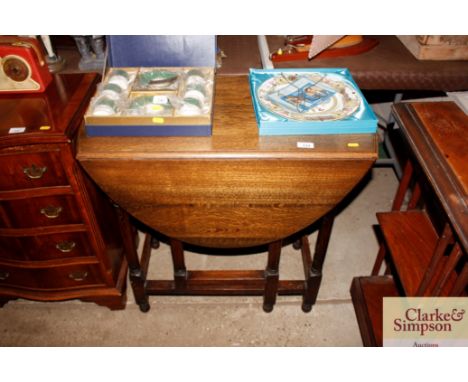 An oak gate leg dining table 