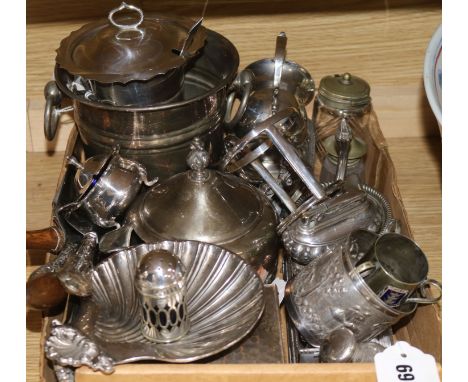 An Eastern embossed white metal mug, a silver napkin ring and sundry silver and plated items, etc., including a silver-topped