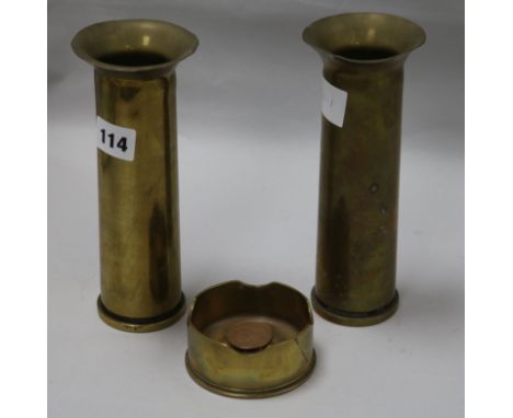 Three Trench art shell cases