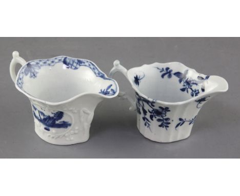 Two Worcester blue and white creamboats in the Bare Tree Pagoda and Prunus Root patterns, c.1754-60, the former moulded with 