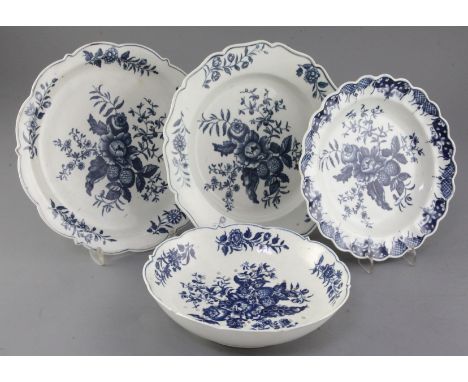 A Worcester pine cone pattern blue and white wares - a strainer and three plates, c.1770-5, all with cross hatched crescent m