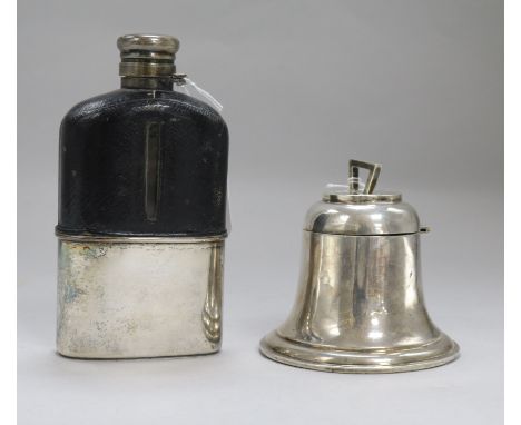 A silver bell-shaped inkwell and a leather and plate hip flask with silver top