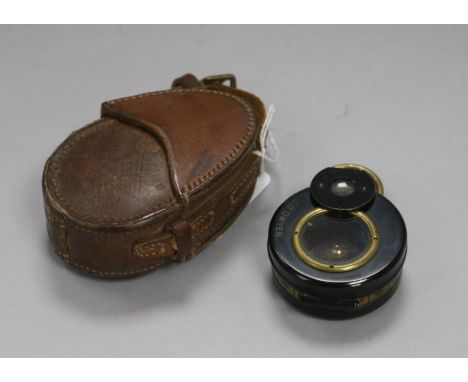 A Barkers Patent military compass in leather case