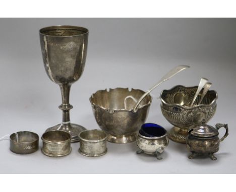 A silver presentation goblet and sundry silver items, including two circular pedestal bowls, one of plain form with shaped cu