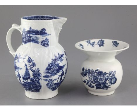 A Caughley blue and white floral spittoon, c.1780 and a Caughley fisherman and cormorant pattern mask jug, height 12cm and 18