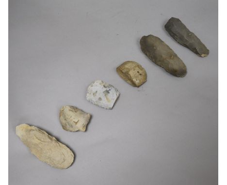 Six prehistoric flint axe heads, various, including one from Maizieres, France, L 14cm, one from Bretteville-le-Rabet, France
