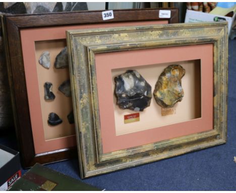 A framed display containing a Paleolithic Henley Pit chopper core and Moortown Pit handaxe and two other displays, including 