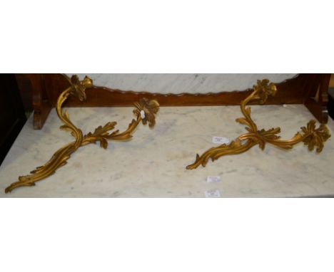 Pair of Rococo style gilt metal two light wall brackets, foliate outlines, 43cm.