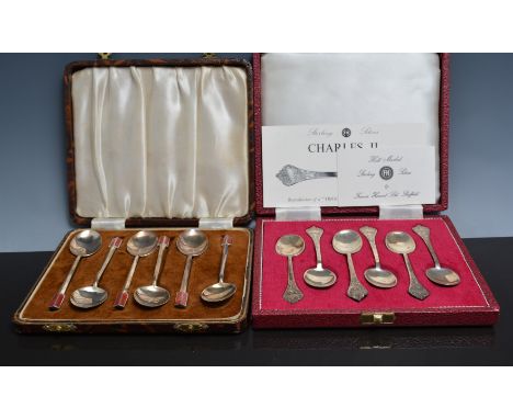 Set of six lace back trepid egg spoons, Sheffield 1971, cased and a set of six silver and enamel coffee spoons, Birmingham 19