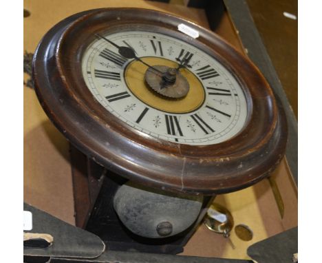 Stained wood postmans type alarm clock, silver dial, movement striking on a bell, diameter 28cm.