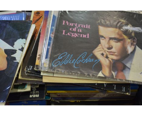 Quantity of long playing records, Elvis Presley, Country and Western, Rock and Roll etc, in a large suitcase.
