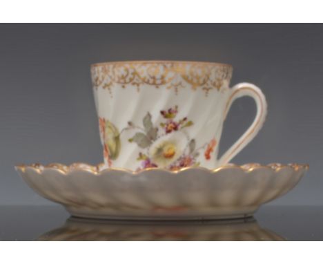 Four Dresden porcelain coffee cups and saucers, wrythen moulded, painted with flowers and two English bone china tea cups and
