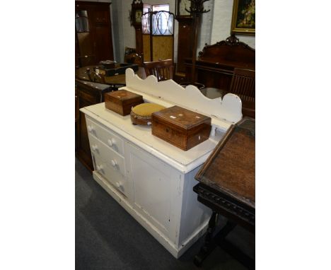 Painted pine Lincolnshire dresser, with a shelf over, fitted with three drawers and a panelled door, width 122cm.
