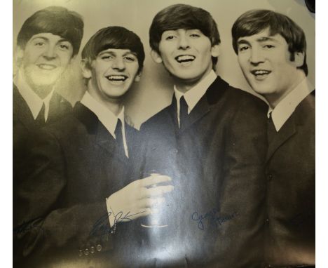 The Beatles:  Photographic print with facsimile signatures.