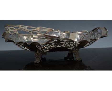 Edwardian silver dessert basket by Henry Wilkinson Limited, Birmingham 1905, shaped, pierced and fluted form with a swing han