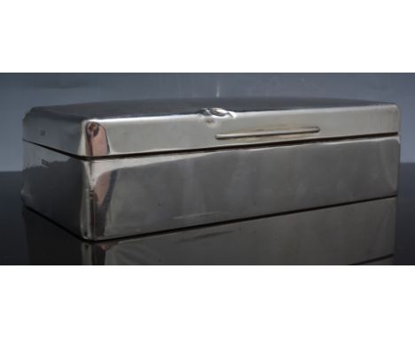 Silver cigarette box, London 1925, engine turned decoration, cedarwood lined, width 18cm, together with an Edwardian silver b