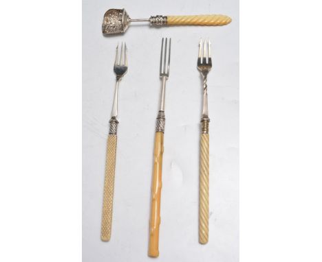 George IV silver caddy spoon, Birmingham 1822, embossed shovel bowl, spiral twist ivory handle, a Victorian silver pickle for