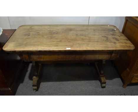 William IV mahogany sofa table, rectangular top with rounded corners, fitted with a flush faced single drawer, shaped standar