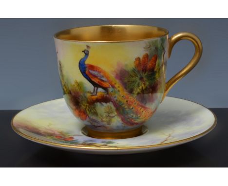 Royal Worcester cabinet coffee cup and saucer, circa 1930, the cup painted with a Peacock, signed G. Johnson.