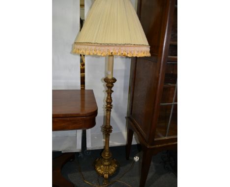 Parcel gilt standard lamp, candlestick form, complete with pleated shade, 155cm.