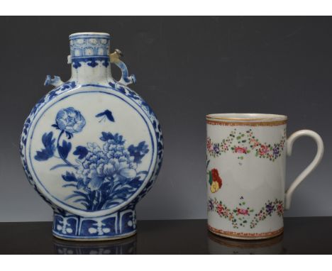 Chinese blue and white moon flask, bearing four character mark, decorated with a butterfly and flowers, damaged and repaired,