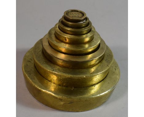 A Graduated Set of Eight 1946 Brass Avery Scale Weights 