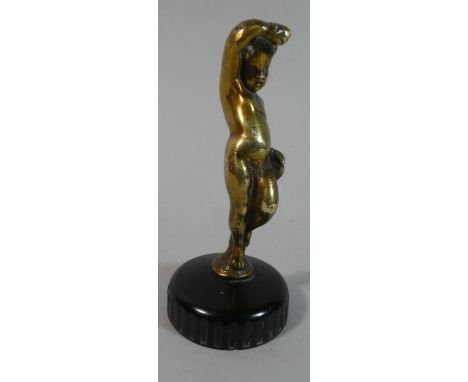 A Gilt Metal Vintage Car Mascot in the Form of Cherub Holding Jug, 12cm high 