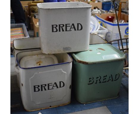 A Collection of Five Enamel Bread Bins 