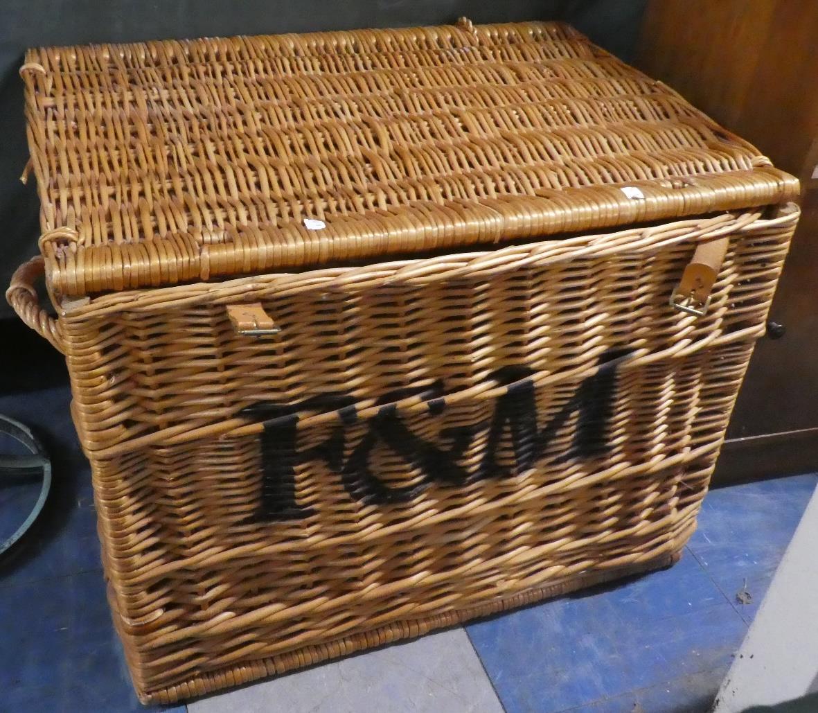 A Large Fortnum and Mason Wicker Basket with Two Rope Carrying Handles
