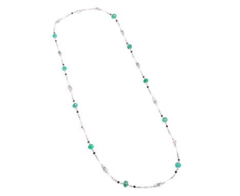 A diamond, emerald and black onyx necklace chain, the chain of alternating oval, circular and interlocking circular links, se