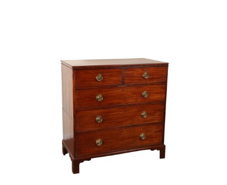 A George III mahogany chest of drawers, the moulded rectangular top above two short over three long graduated drawers, each w