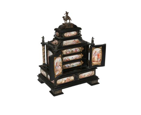 A Renaissance Revival ebonised and enamel mounted table cabinet, probably Vienna, c. 1880-90, with enamel plaques of mytholog