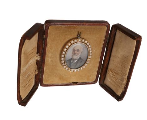 A 19th Century portrait miniature of a gentleman, in an oval frame set with half pearls, in a fitted leather case. Frame 57mm