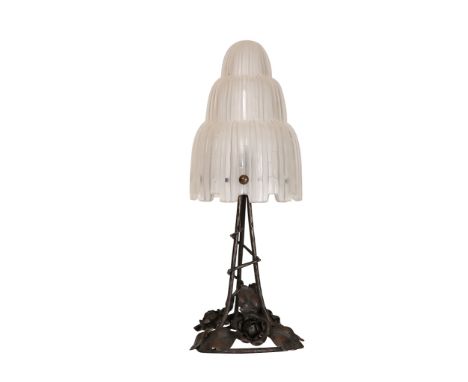 Sabino, a wrought metal and moulded glass table lamp, with waterfall shade and foliate base, moulded marks. 39.5cm