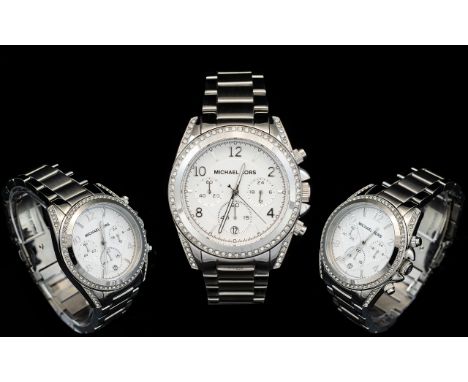 Michael Kors MK5165 Ladies Blair Chronograph Watch. Features Silver Dial, Glittering Stone Set Bezel, Multi Dial, Clock Face,