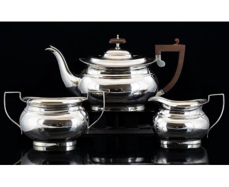 A Silver 3 Piece Tea Service. Comprises Large Teapot, Milk Jug and Sugar Bowl. Hallmark Birmingham 1925. All Pieces are In Ex