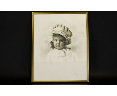 A Vintage Photographic Portrait Of Female Infant Framed and mounted under glass, black and grey vignette portrait of young gi
